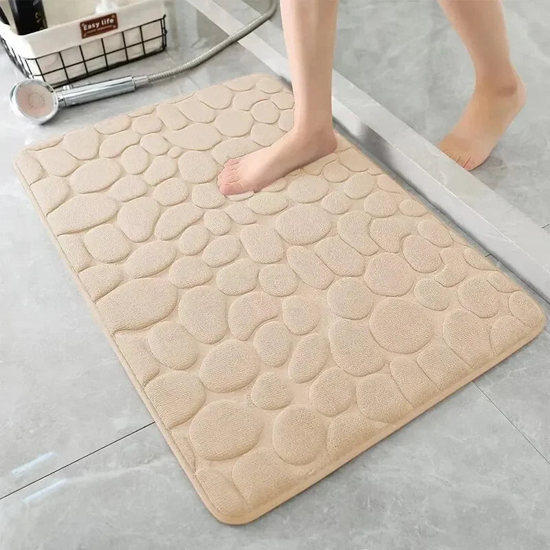 The bathroom door is embossed with pebbles, memory foam bath towel, water absorption, anti-skid indoor floor mat, foot pad