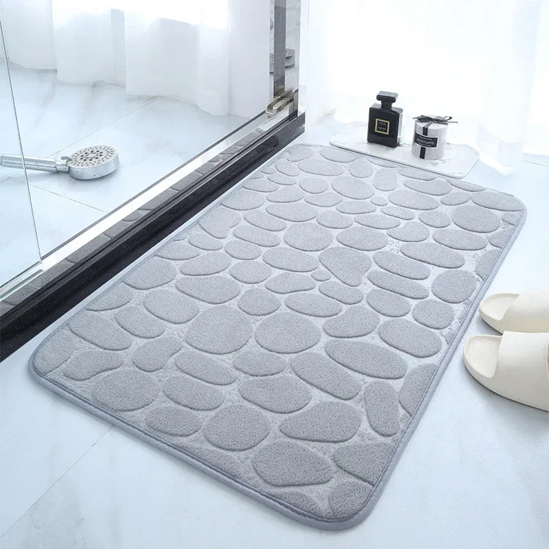 The bathroom door is embossed with pebbles, memory foam bath towel, water absorption, anti-skid indoor floor mat, foot pad