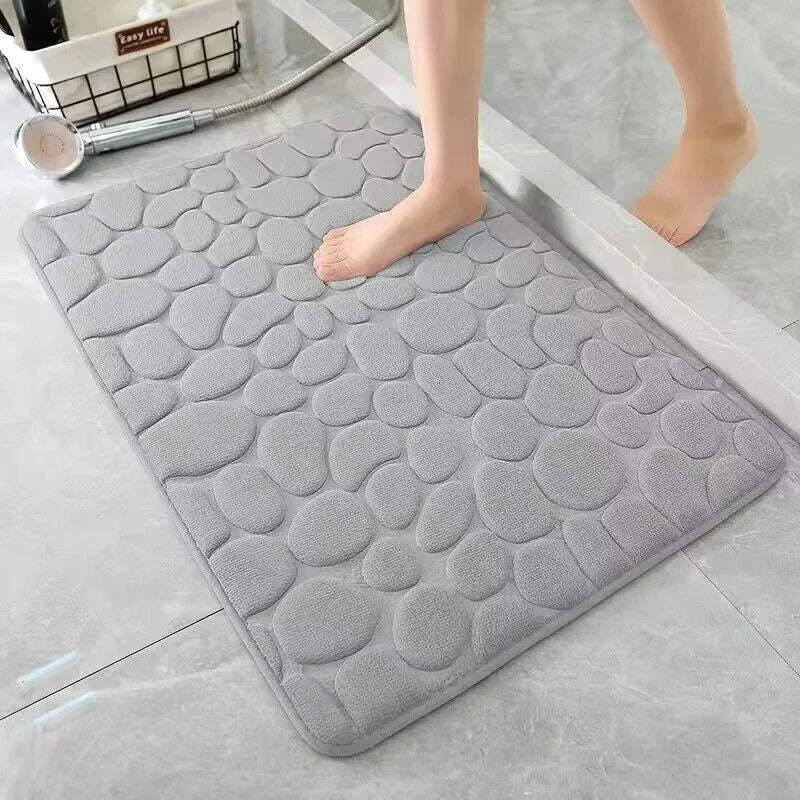 The bathroom door is embossed with pebbles, memory foam bath towel, water absorption, anti-skid indoor floor mat, foot pad