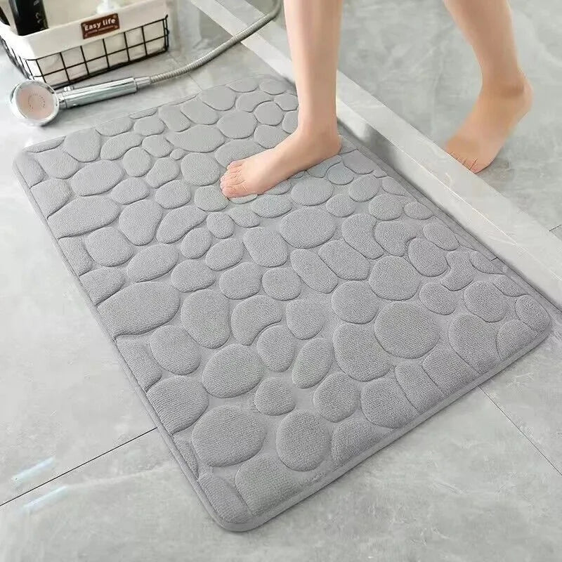 The bathroom door is embossed with pebbles, memory foam bath towel, water absorption, anti-skid indoor floor mat, foot pad